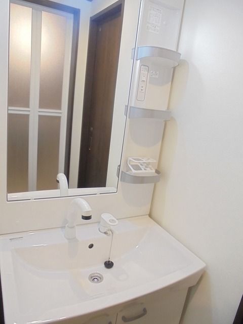 ��ʌ��������܎s�k����i���Q���ڂ̃A�p�[�g�̐��ʏ�